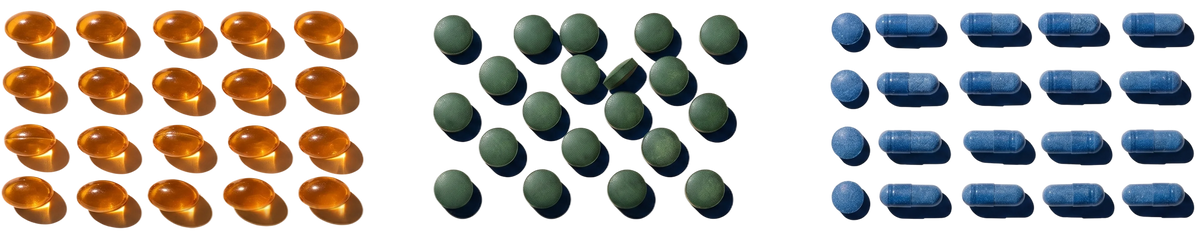 Three groups of small 3D-rendered objects on a plain white background: amber/orange capsule-like pieces on the left, dark green rounded pieces in the middle, and blue capsule-like pieces on the right.
